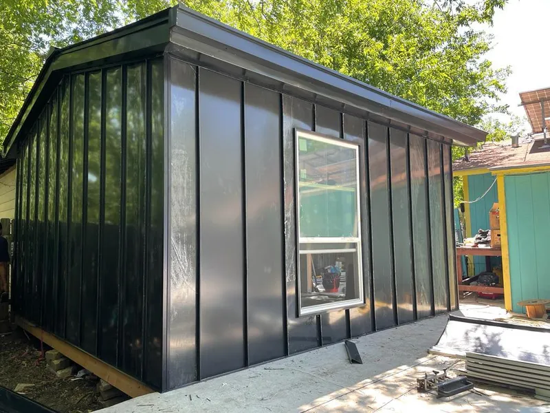 Black standing seam metal wall panels for Metal Roof Installation in Grand Island