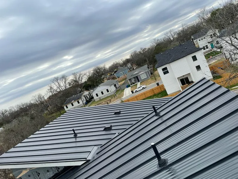Standing seam metal roof panels with vents for Skylight Repair in Grand Island